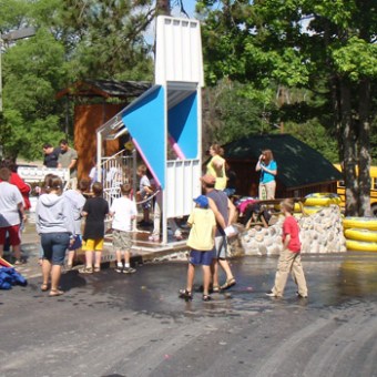 a group of people walking down the street