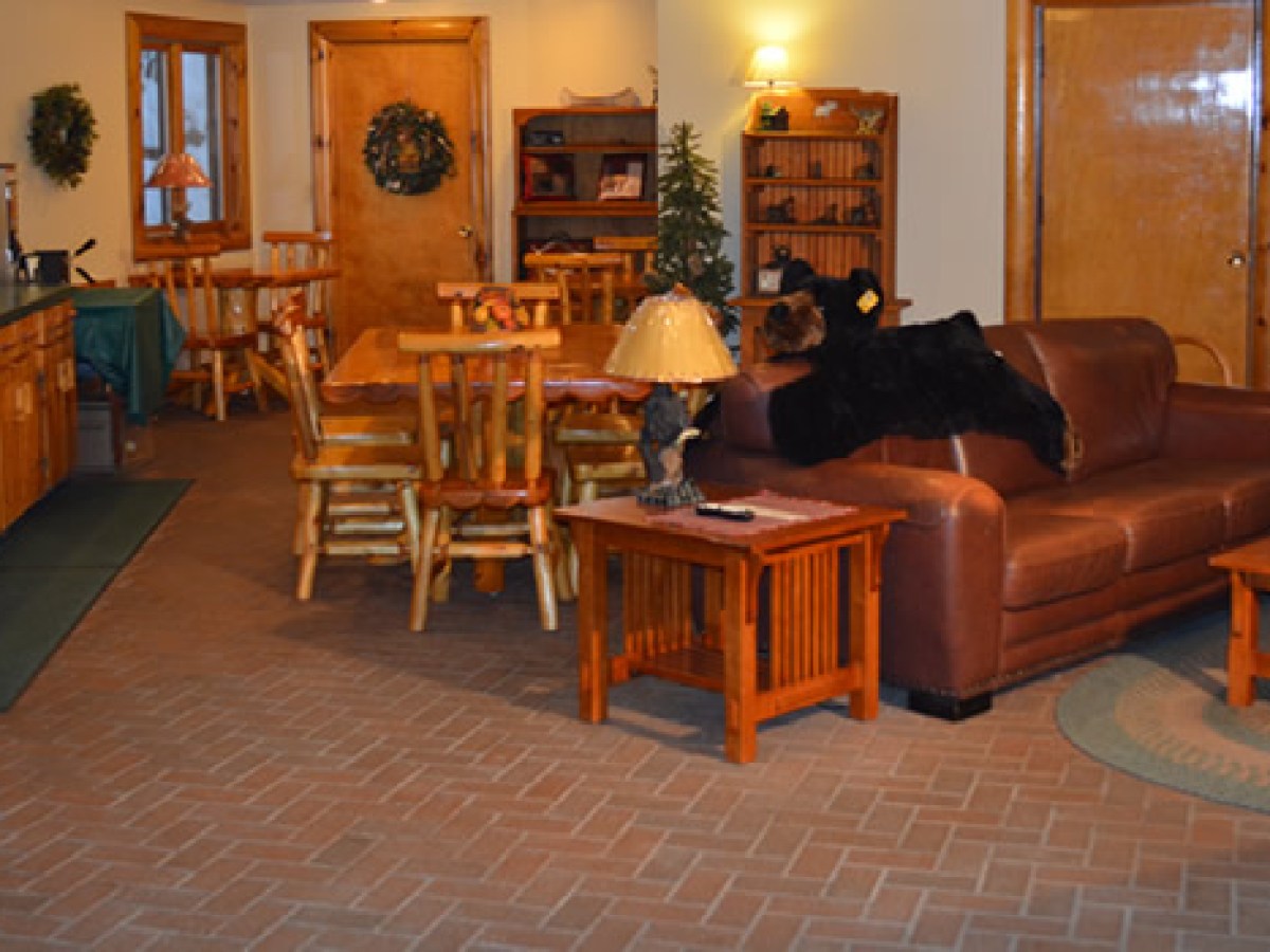 a living room filled with furniture and a fireplace